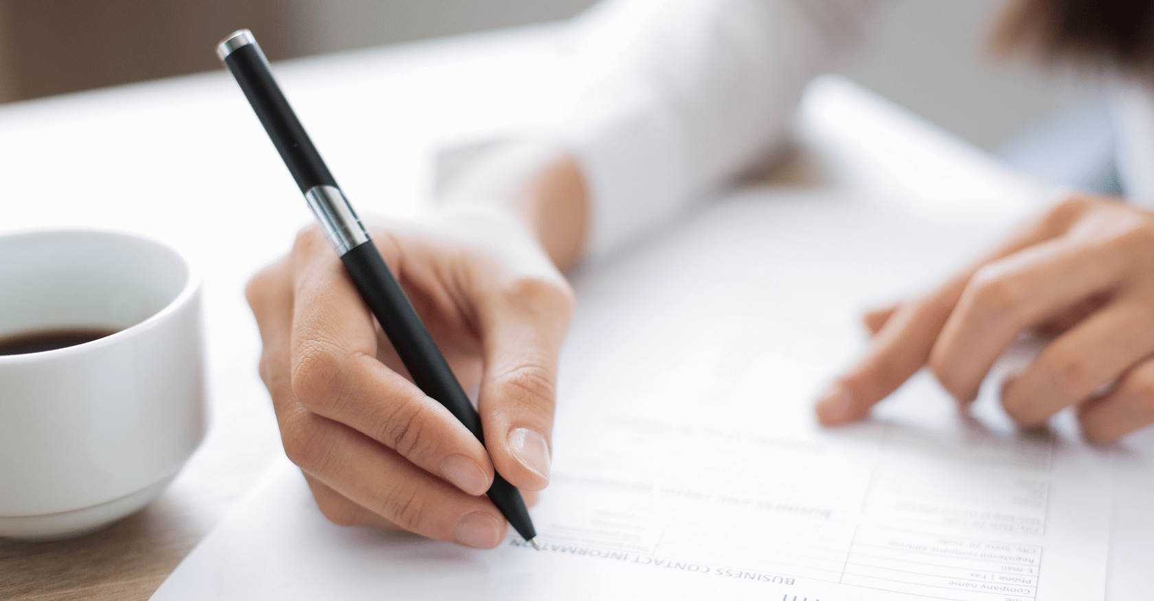 Obrazek przedstawiający pisanie wniosku przez przedsiębiorcę